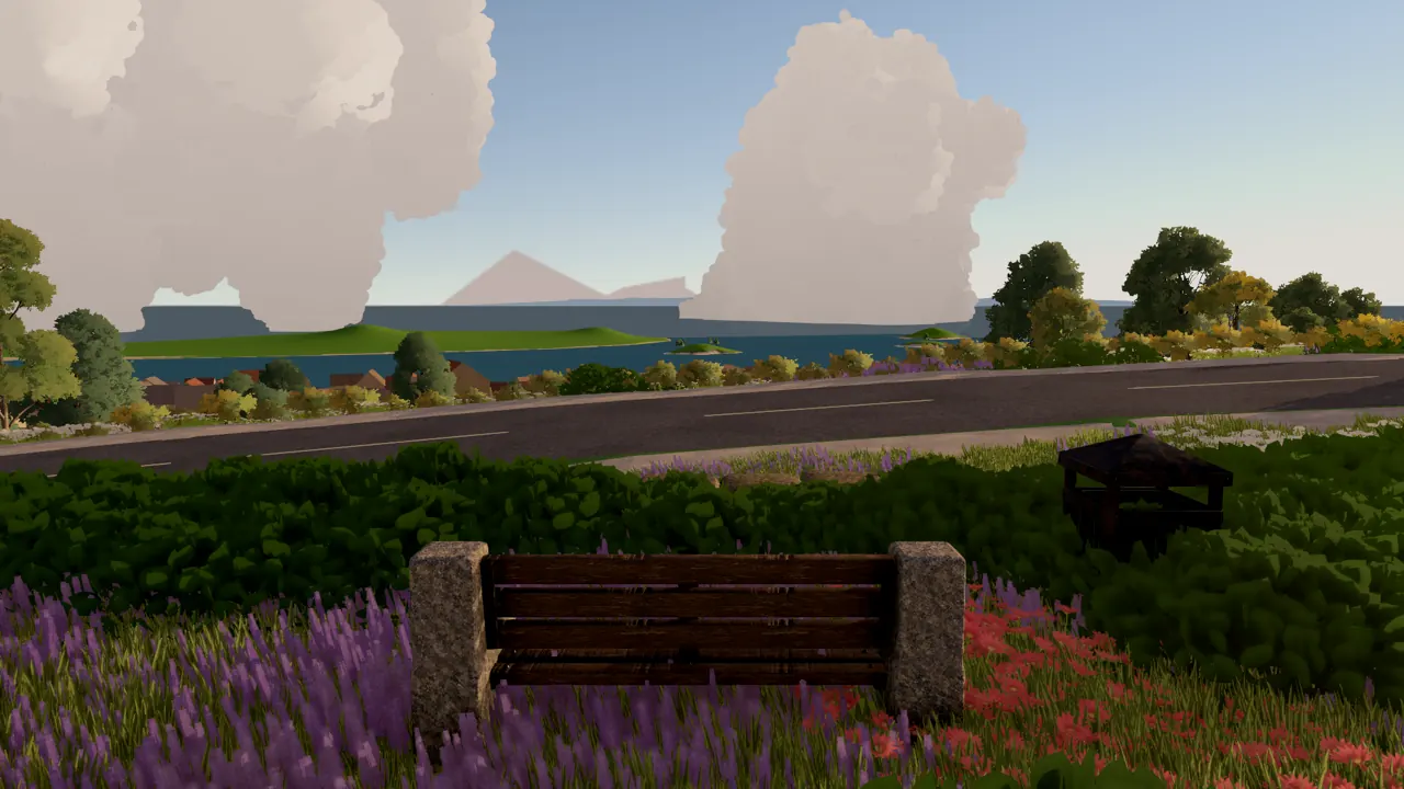 A wooden bench among lavender at the Overlook, with the road and the bay beyond it.