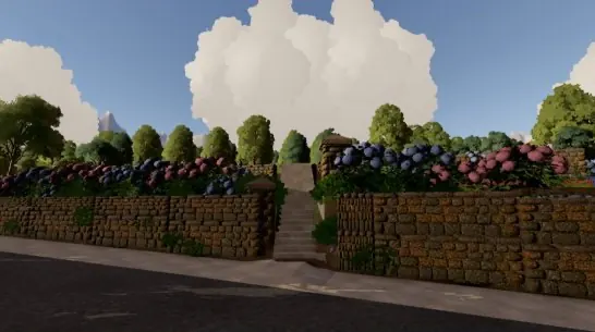 Flowerbeds on top of dry-stone walls along the street.